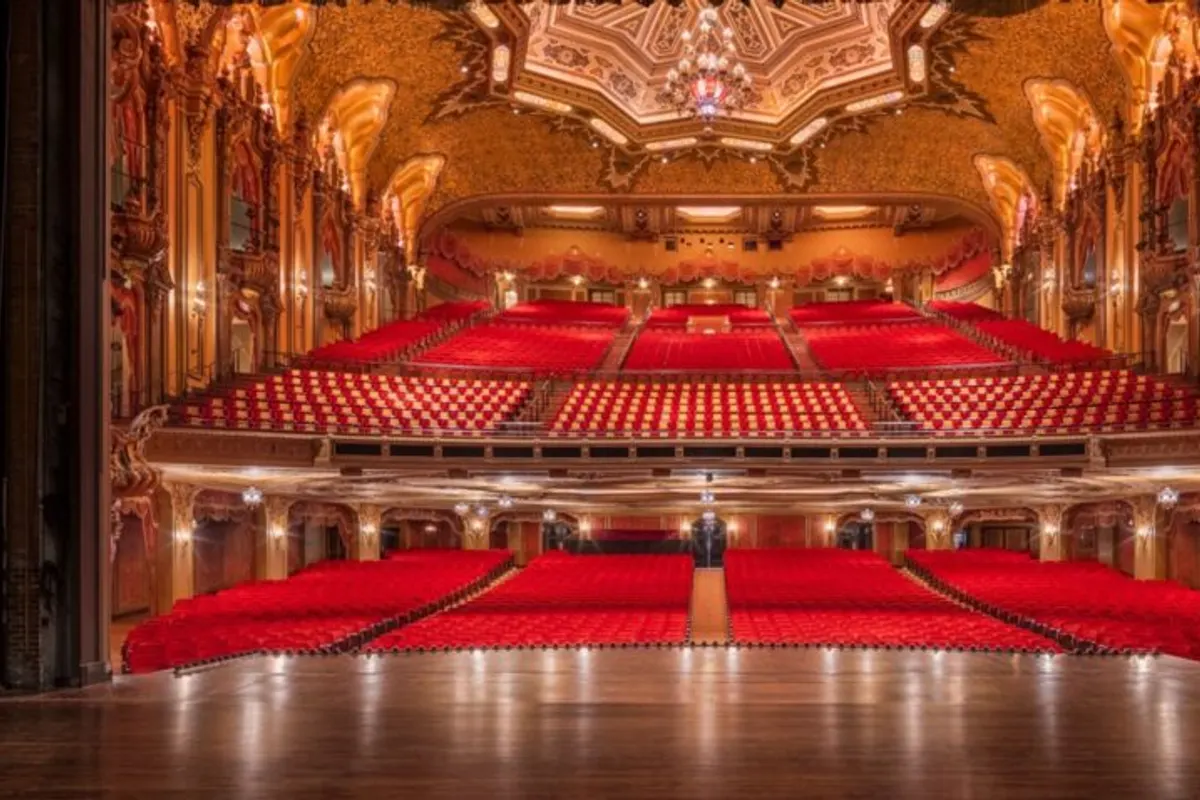 Red-seated balcony and ornate ceiling of the Ohio Theatre from the stage